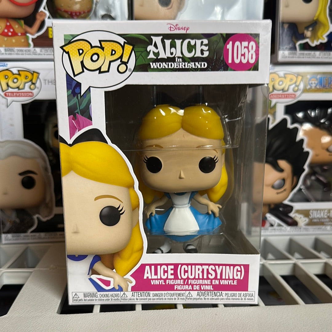 Funko Pop! Alice Curtsying 1058 – Black Light – Disney – Neuve Sous Blister